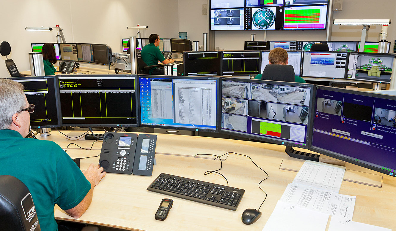 JST References - Nürnberger Wach- und Schließgesellschaft: control room with large display wall