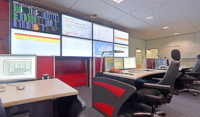 Generali Aachen - IT control centre of JST - operator workstations in front of the large display wall