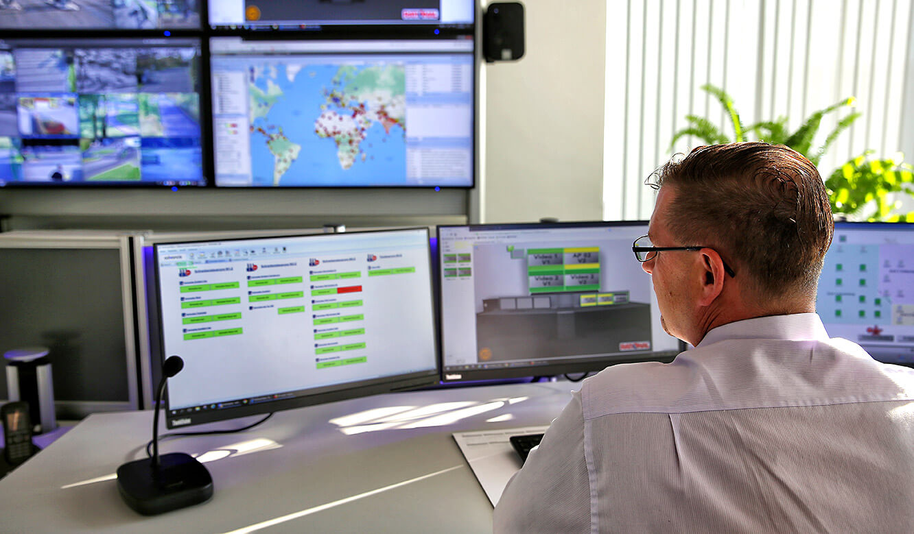 JST Rational control room: Workstation monitors and monitor wall in the security control centre