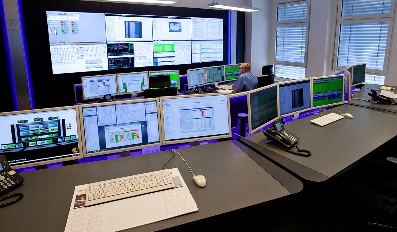 JST Volkswagen FIS control room: monitor wall and operator workstations