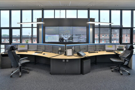 JST reference EVB operating control centre: control centre workstations in front of the video wall