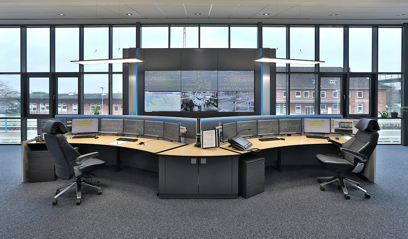 JST reference EVB operating control centre: control centre workstations in front of the video wall