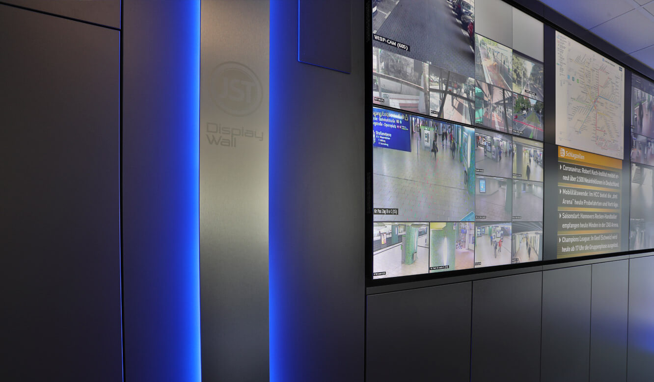 JST Referenz protec service GmbH - modern IT solution emergency control center - video wall with large screen displays and lighting for alarm detection