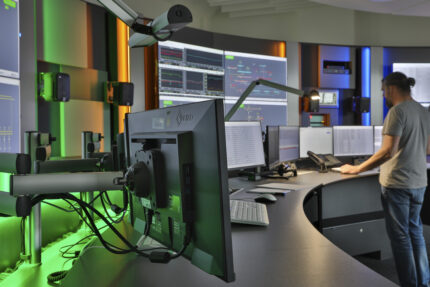 JST TraveNetz network control center modernization - control room furniture and video wall